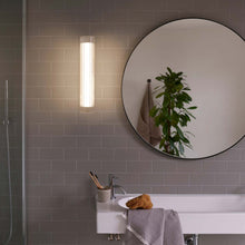 Load image into Gallery viewer, io LED Wall Light in bathroom.
