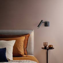 Load image into Gallery viewer, Leda Swing Arm Wall Light in bedroom.
