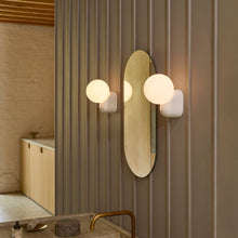 Load image into Gallery viewer, Lyra Bath Wall Light in bathroom.
