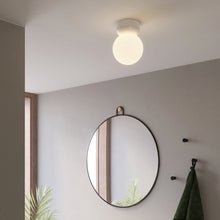 Load image into Gallery viewer, Lyra Flush Mount Ceiling Light in living room.
