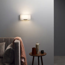 Load image into Gallery viewer, Venn Wall Light in living room.
