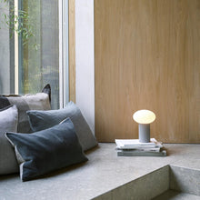 Load image into Gallery viewer, Zeppo LED Portable Table Lamp in living room.
