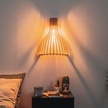 Load image into Gallery viewer, Ariel Wall Light in bedroom.

