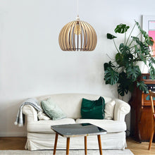 Load image into Gallery viewer, Atlas Pendant Light in living room.
