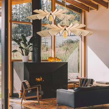 Load image into Gallery viewer, Aurora Pendant Light in living room.
