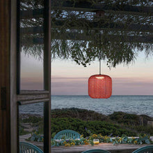 Load image into Gallery viewer, Nans Outdoor LED Pendant Light in Outside Area.

