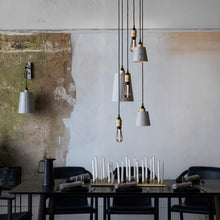 Load image into Gallery viewer, Buster Medium Base 120V LED Bulb in dining room.
