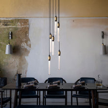 Load image into Gallery viewer, Buster Tube Medium Base 120V LED Bulb in dining room.
