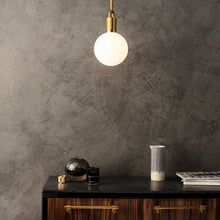 Load image into Gallery viewer, Forked Globe Pendant Light in living room.
