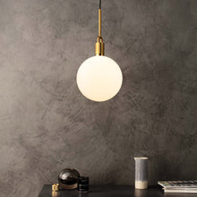 Load image into Gallery viewer, Forked Globe Pendant Light in living room.
