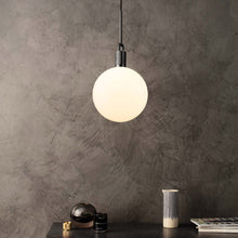 Load image into Gallery viewer, Forked Globe Pendant Light in living room.
