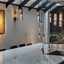 Load image into Gallery viewer, Heavy Metal Pendant Light in living room.
