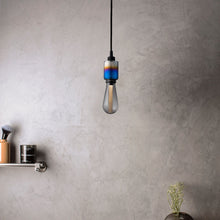 Load image into Gallery viewer, Heavy Metal Pendant Light in living room.
