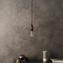 Load image into Gallery viewer, Heavy Metal Pendant Light in living room.

