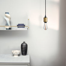 Load image into Gallery viewer, Heavy Metal Pendant Light in living room.

