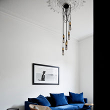 Load image into Gallery viewer, Hooked Nude Multi Light Pendant Light in living room.
