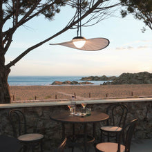 Load image into Gallery viewer, Bloom Outdoor LED Pendant Light in Outside Area.
