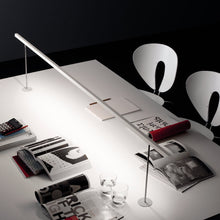 Load image into Gallery viewer, Lineal Biblo LED Table Lamp in living room.

