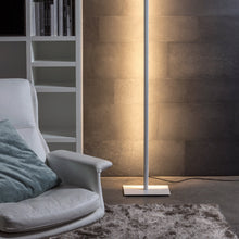 Load image into Gallery viewer, Lineal LED Floor Lamp in living room.
