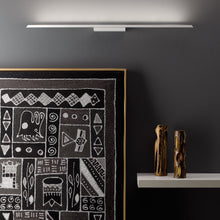 Load image into Gallery viewer, Lineal LED Wall Light in living room.
