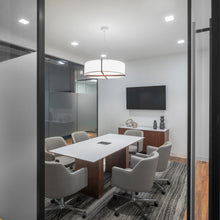 Load image into Gallery viewer, Plura LED Pendant Light in office.

