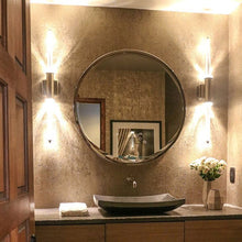 Load image into Gallery viewer, Harlow LED Wall Light in bathroom.
