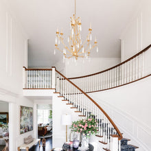 Load image into Gallery viewer, Prosecco Chandelier in living room.
