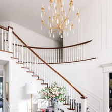 Load image into Gallery viewer, Prosecco Chandelier in living room.
