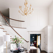Load image into Gallery viewer, Prosecco Chandelier in living room.
