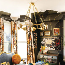 Load image into Gallery viewer, Riviere LED Chandelier in living room.
