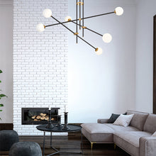 Load image into Gallery viewer, Cosmet Pendant Light in living room.
