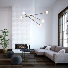 Load image into Gallery viewer, Cosmet Pendant Light in living room.
