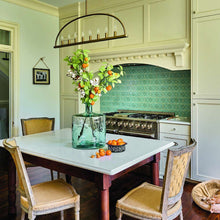 Load image into Gallery viewer, Abbott Linear Chandelier in dining room.
