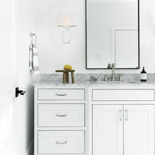 Load image into Gallery viewer, Brinkley Wall Light in bathroom.
