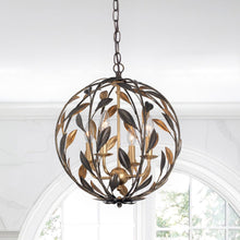 Load image into Gallery viewer, Broche Sphere Chandelier in living room.
