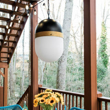 Load image into Gallery viewer, Capsule Outdoor Pendant Light in Outside Area.
