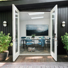 Load image into Gallery viewer, Capsule Outdoor Wall Light in Outside Area.
