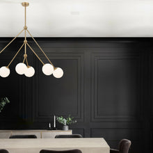 Load image into Gallery viewer, Omni Chandelier in living room.
