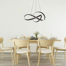 Load image into Gallery viewer, Twirl LED Pendant Light in dining room.
