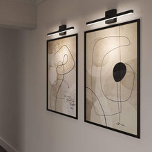 Load image into Gallery viewer, Portrait LED Vanity Wall Light in living room.
