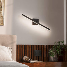 Load image into Gallery viewer, Portrait LED Vanity Wall Light in bedroom.
