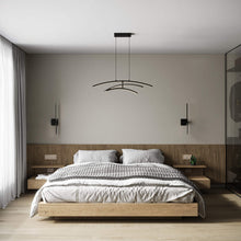 Load image into Gallery viewer, Sway LED Pendant Light in bedroom.

