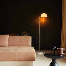 Load image into Gallery viewer, Mezzaluna LED Floor Lamp in living room.
