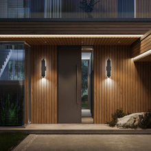 Load image into Gallery viewer, Arrow Outdoor LED Wall Light in Outside Area.
