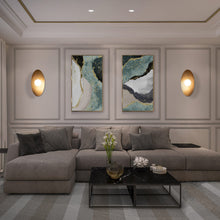 Load image into Gallery viewer, Glamour LED Vanity Wall Light in living room.
