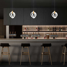 Load image into Gallery viewer, Knot LED Pendant Light in kitchen.
