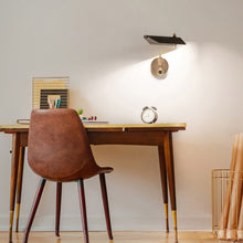Load image into Gallery viewer, Loyd LED Swing Arm Wall Light in living room.
