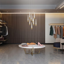 Load image into Gallery viewer, Quill Round LED Multi Pendant Light in changing room.
