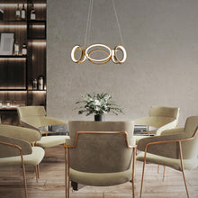 Load image into Gallery viewer, Solitaire LED Pendant Light in living room.
