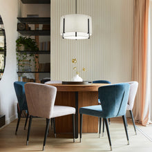 Load image into Gallery viewer, Strum LED Pendant Light in living room.
